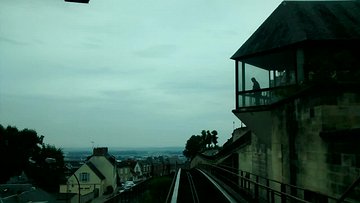 20160818_VID133650a_MotoG-JEB Unfortunately a very dull day. This is a video of the descent from the Hôtel de Ville to the Gare - the second part of our ride on the cable car system