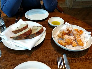 IMG_20170419_182607787_HDR Bread, extra virgin olive oil, and parmesan fries (churros)